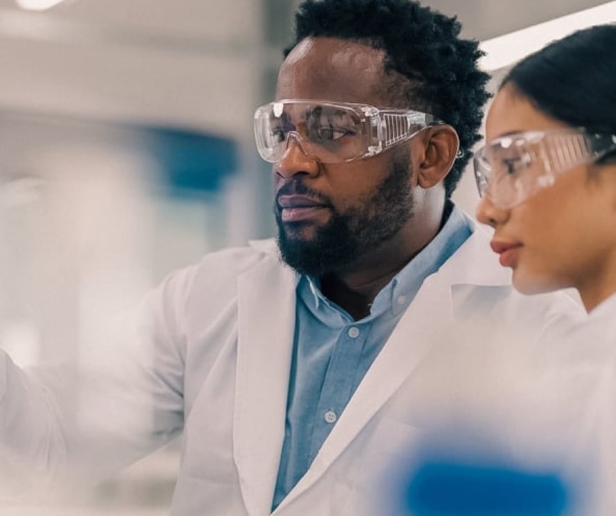 Two people with safety glasses